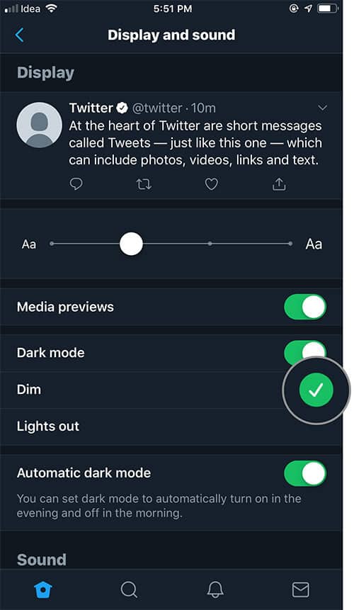 Select Dim to enable Twitter blue gray color dark mode on iPhone or iPad