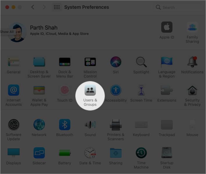 Open Users  Groups in System Preferences on Mac