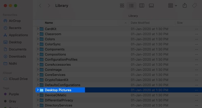 Double click Desktop Pictures folder from Library on Mac