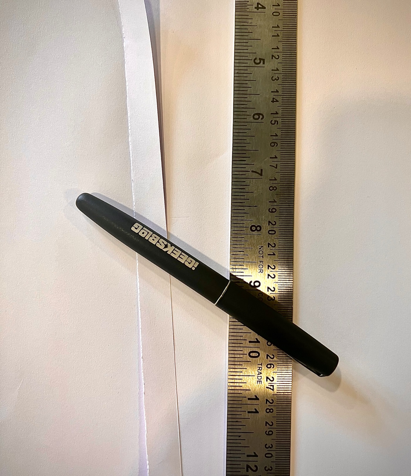 Take an A4 size sheet pen and ruler and cut a strip