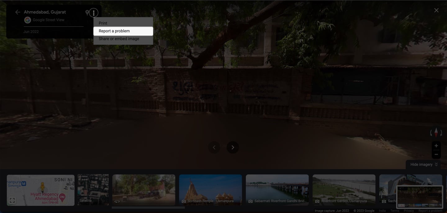 Tap the three dot icon click report a issue in google maps street view