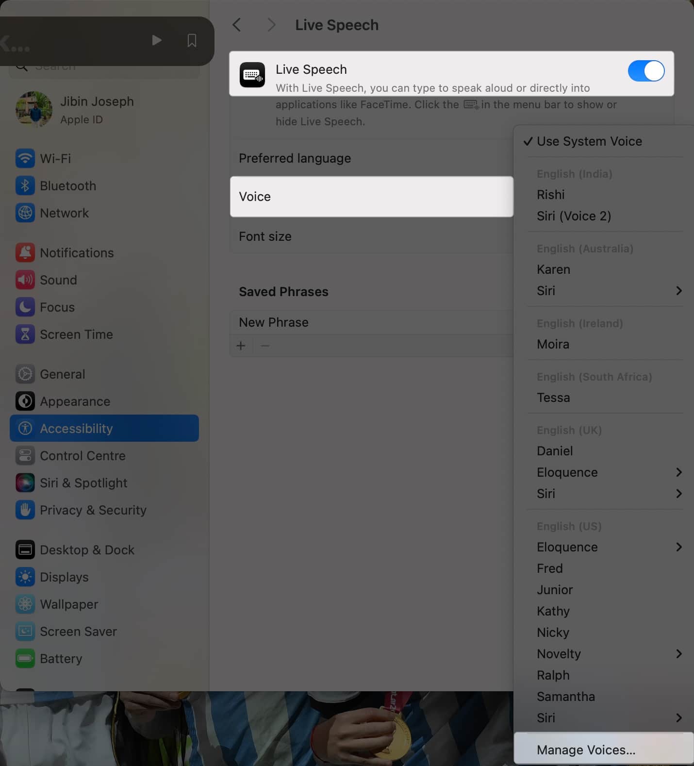 Toggle on Live Speech and Go to voices and then manage voices