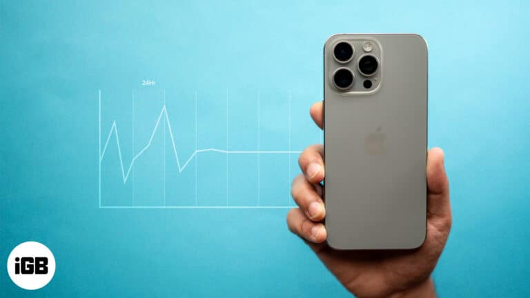 An iPhone in a hand.